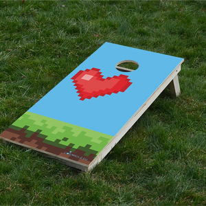 cornhole cœur de vie bonus retro gaming pixelisé, sur le gazon, vue de face