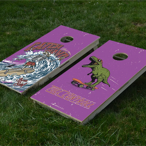 cornhole 2 planches squelette en train de surfer et t-rex en train de rider, sur le gazon, vue de face
