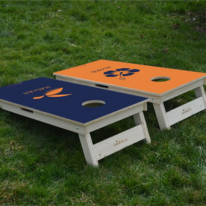 cornhole 2 planches hawaii et haloha, sur le gazon, vue de derrière